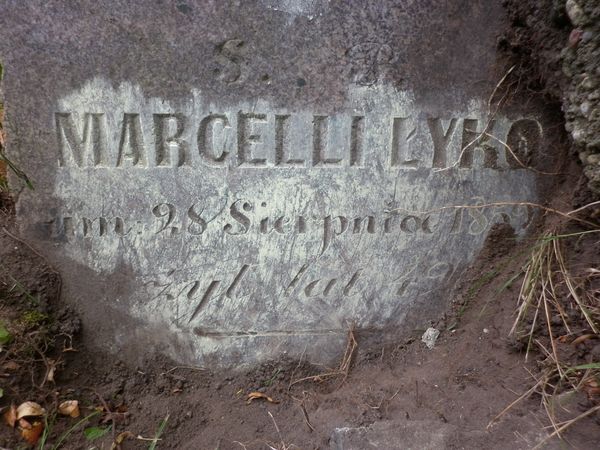 Inscription on the gravestone of Marceli Lyko, Na Rossie cemetery in Vilnius, as of 2013