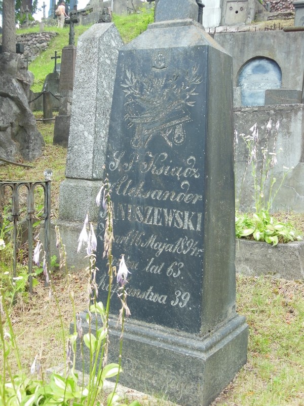 Fragment of the tombstone of Aleksander Januszewski, Ross Cemetery in Vilnius, as of 2014