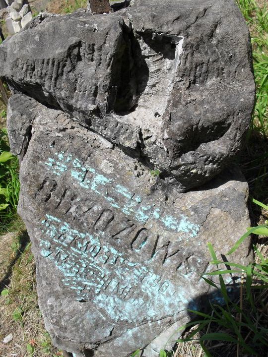 Fragment of the tombstone of Aleksander and Helena Brzozowski, Ross cemetery, as of 2014