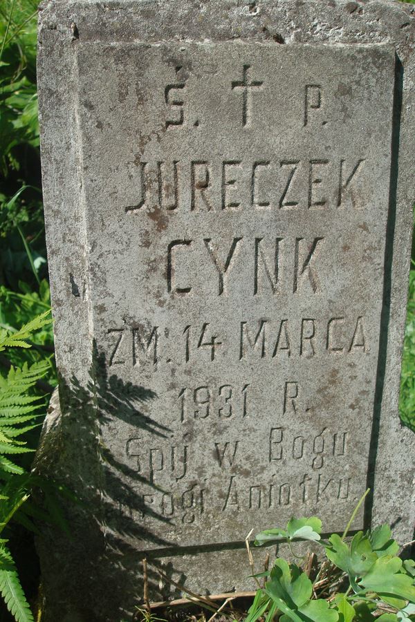 Fragment nagrobka Jerzego Cynk, cmentarz na Rossie, stan z 2013 roku