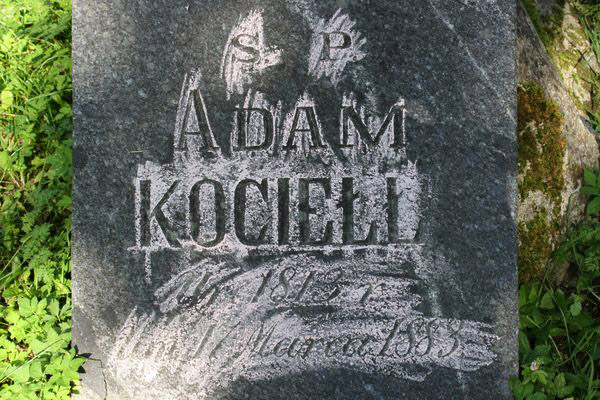 Fragment of Adam Kociel's tombstone from the Ross Cemetery in Vilnius as of 2013.