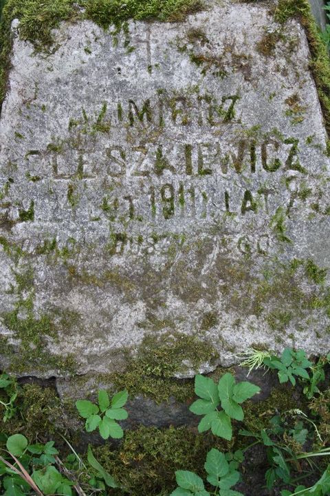 A fragment of Kazimierz Oleszkiewicz's tombstone from the Ross Cemetery in Vilnius, as of 2013.