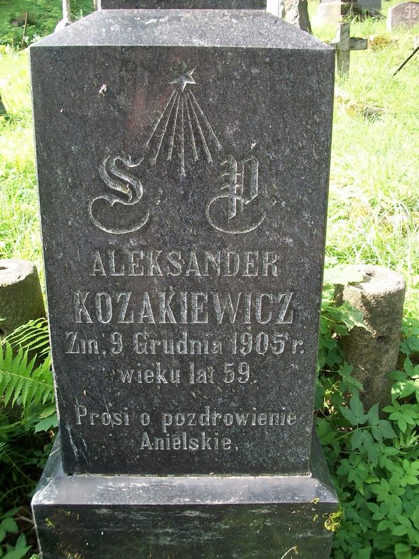 Inscription on the gravestone of Aleksandr Kozakiewicz, Na Rossie cemetery in Vilnius, as of 2013