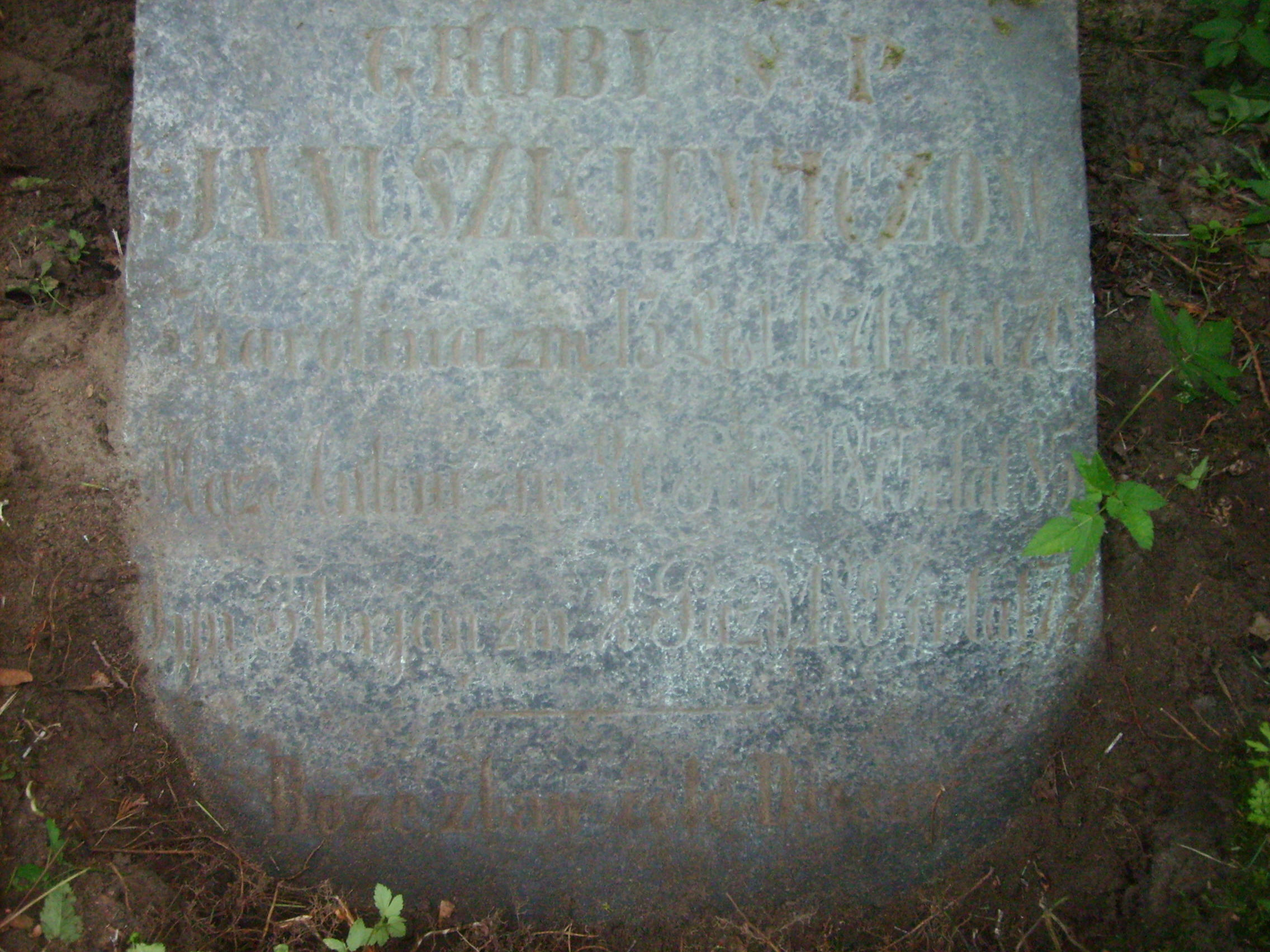 Inscription from the gravestone of the Januszkiewicz family, Na Rossie cemetery in Vilnius, as of 2013