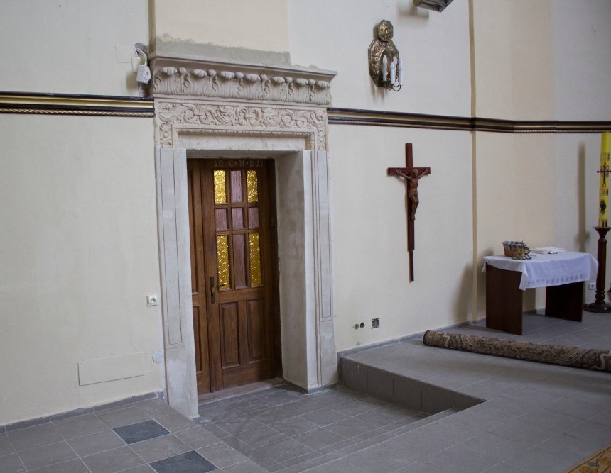 Portal of the entrance to the sacristy of the parish church of Saints Peter and Paul in Brzeżany after restoration