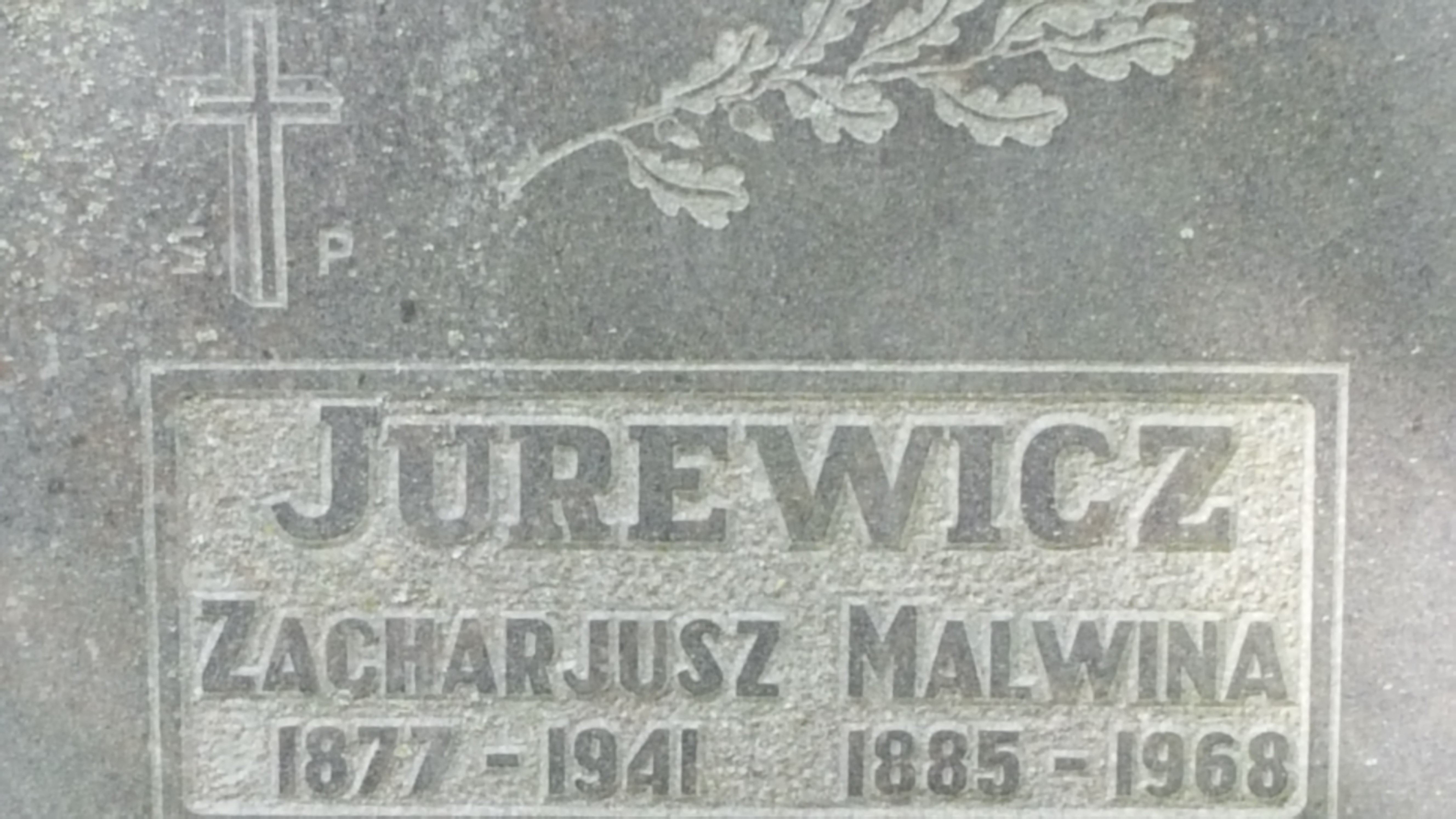 Inscription from the tombstone of Malvina and Zacharjusz Jurewicz, St Michael's cemetery in Riga, as of 2021.