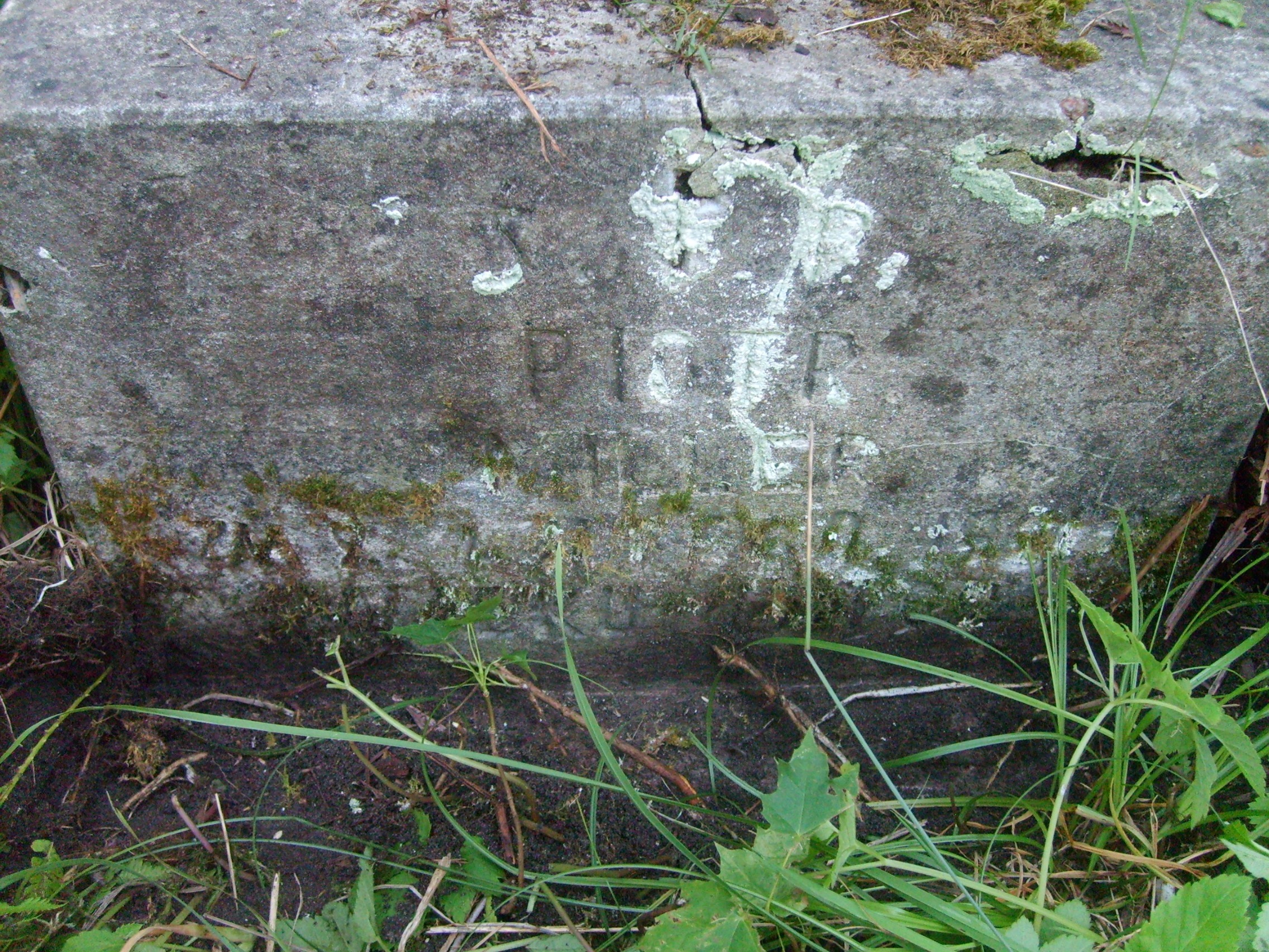 Fragment of a tombstone of Piotr Miller, Na Rossie cemetery in Vilnius, as of 2013