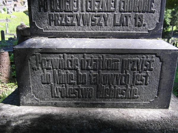 A fragment of a tombstone of Kazimir, Kazia and Władysław Miłkowski, Na Rossie cemetery in Vilnius, as of 2013