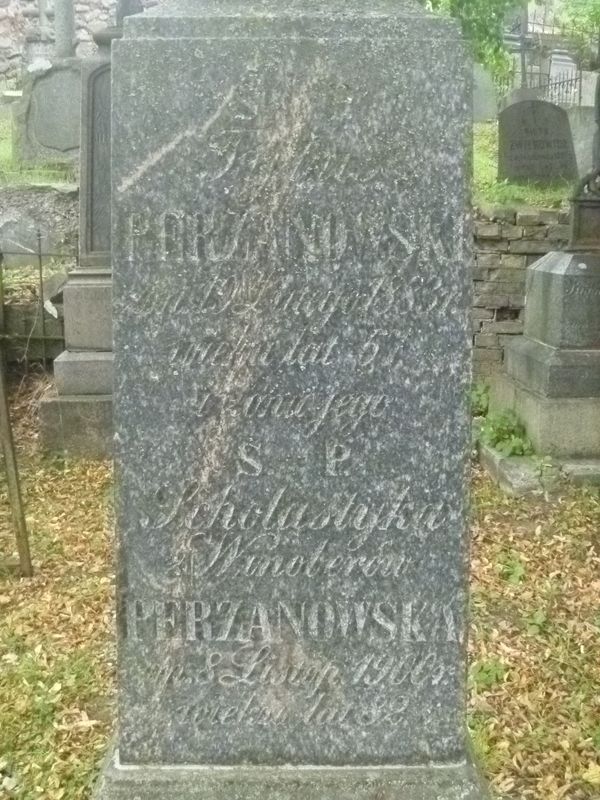 Inscription on the gravestone of Scholastika and Tytus Perzanowski, Na Rossie cemetery in Vilnius, as of 2013