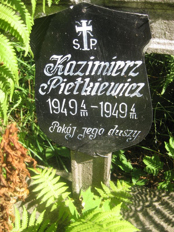 Fragment of Kazimierz Pietkiewicz's tombstone, Ross cemetery, as of 2013