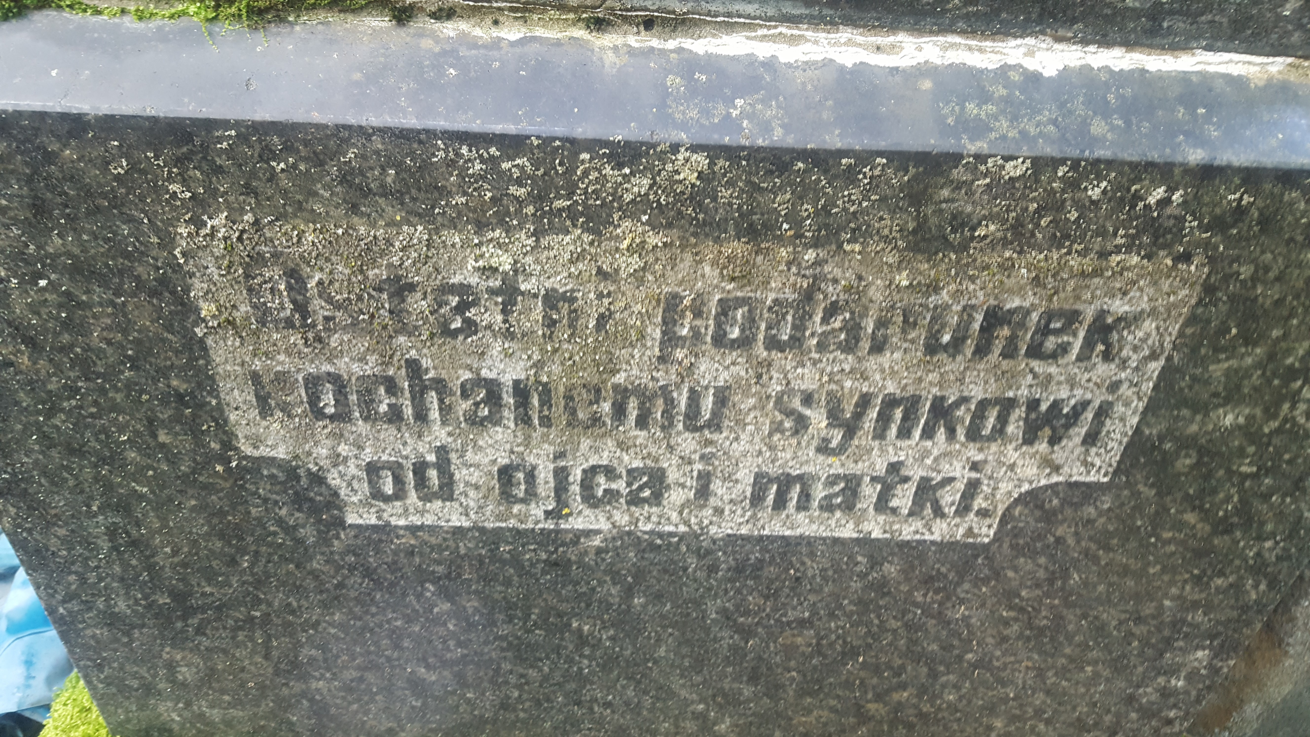 Inscription from the tombstone of Alexander Kuznetsov, St Michael's cemetery in Riga, as of 2021.