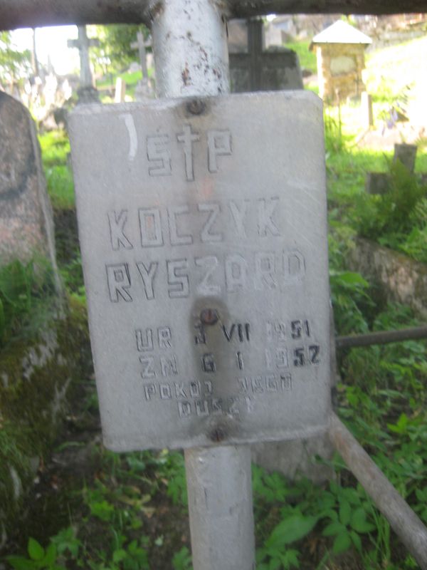 Fragment nagrobka Ryszarda Koczyka, cmentarz na Rossie, stan z 2013 roku