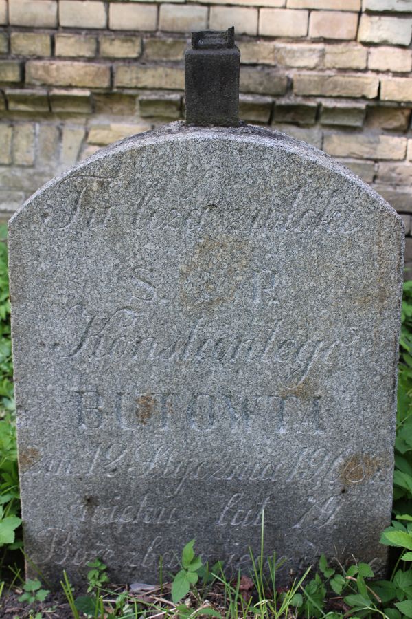 Fragment of a tombstone of Konstanty Butowt, Ross cemetery, state of 2013