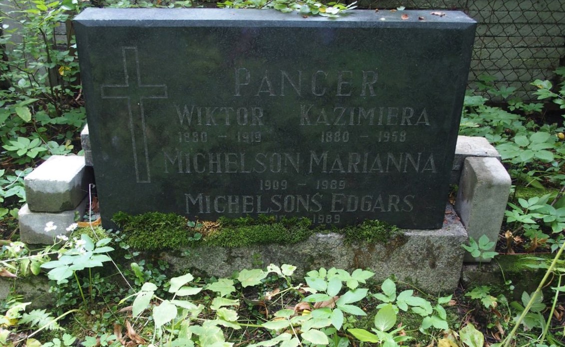 Inscription from the gravestone of Edgars Michelson, Marianna Michelson, Kazimiera Pancer and Victor Pancer, St Michael's Cemetery, Riga, as of 2021.