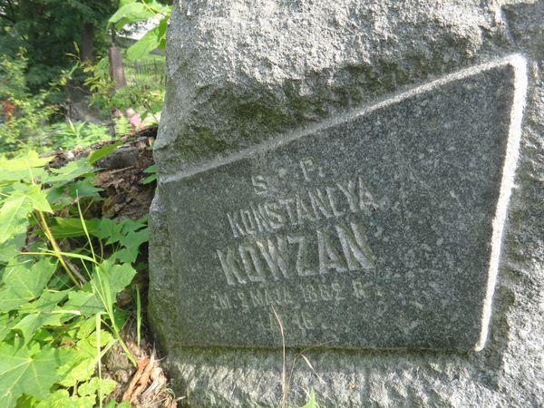 Fragment of the tombstone of Donat and Konstancja Kowzan and Michal Rouba, Na Rossie cemetery in Vilnius, as of 2013.