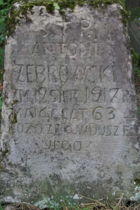 Inscription on the gravestone of Antoni Żebrowski, Na Rossie cemetery in Vilnius, as of 2013