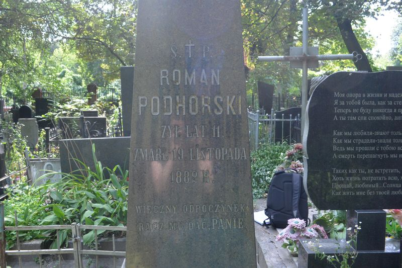 Napis z nagrobka Romana Podhorskiego
