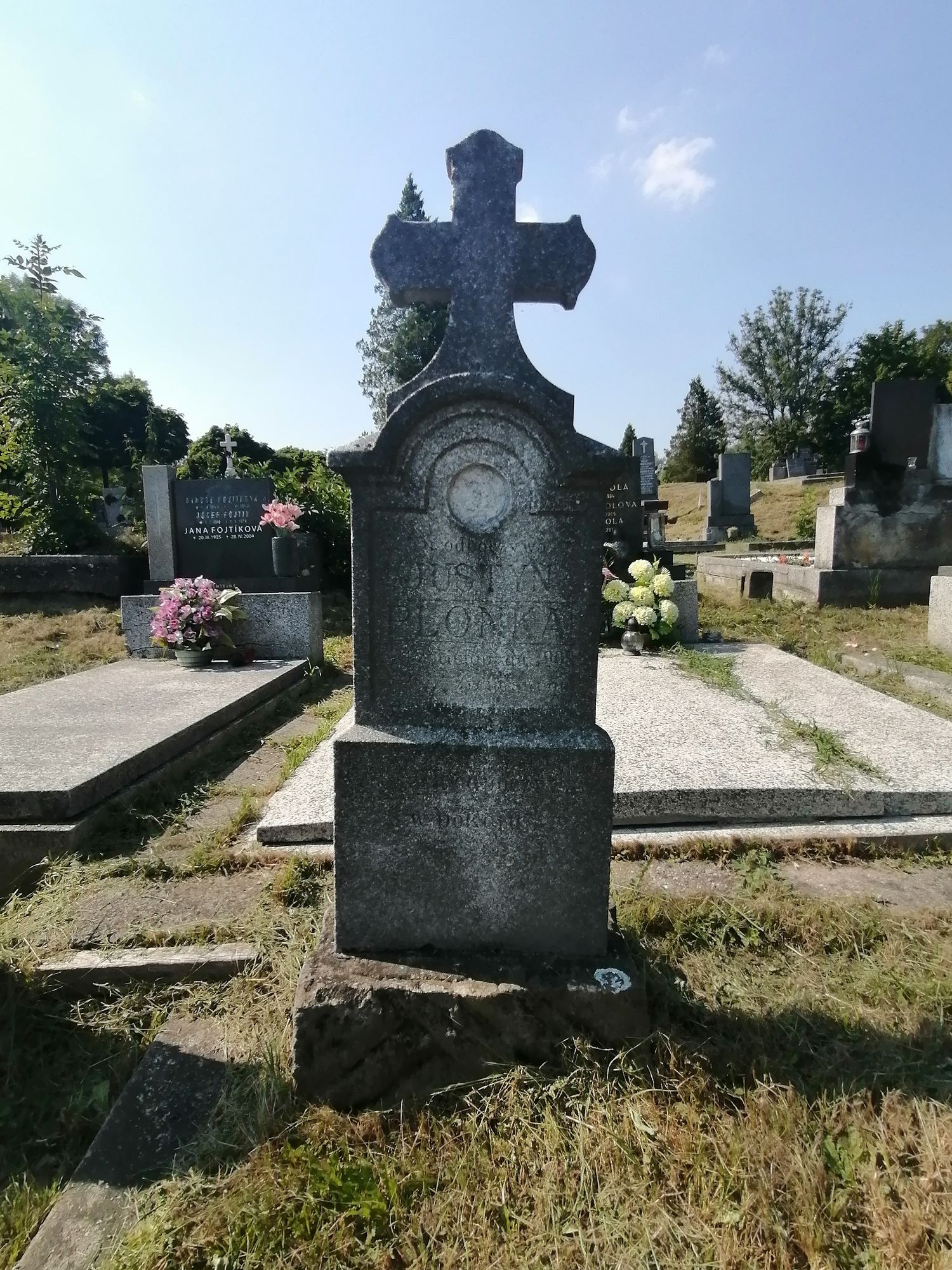 Tombstone of Justin Plonka, Karviná Doly cemetery, state 2022