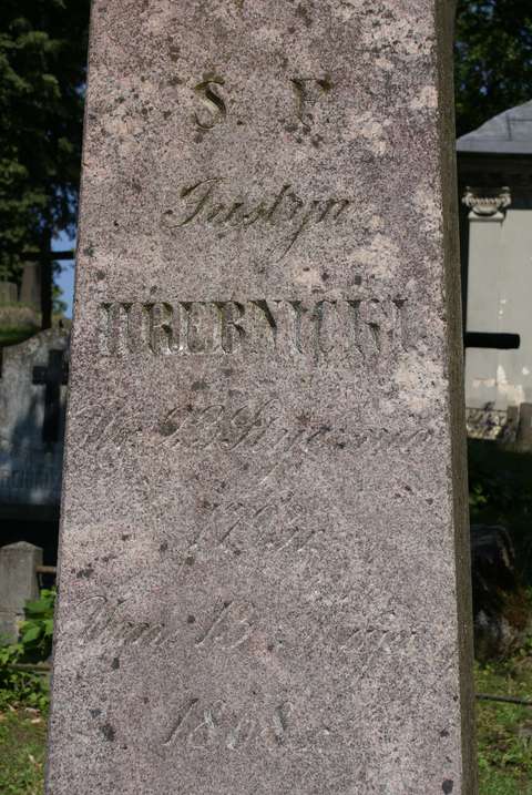 Tombstone of Justyn Hrebnicki, Ross Cemetery in Vilnius, as of 2013.