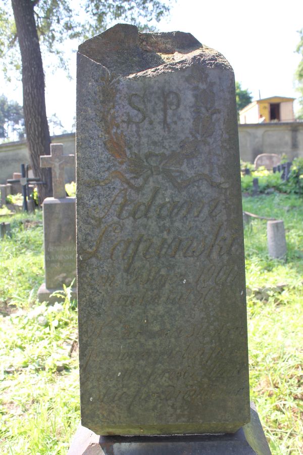 Inscription from the gravestone of Adam Lapinski, Na Rossie cemetery in Vilnius, as of 2013