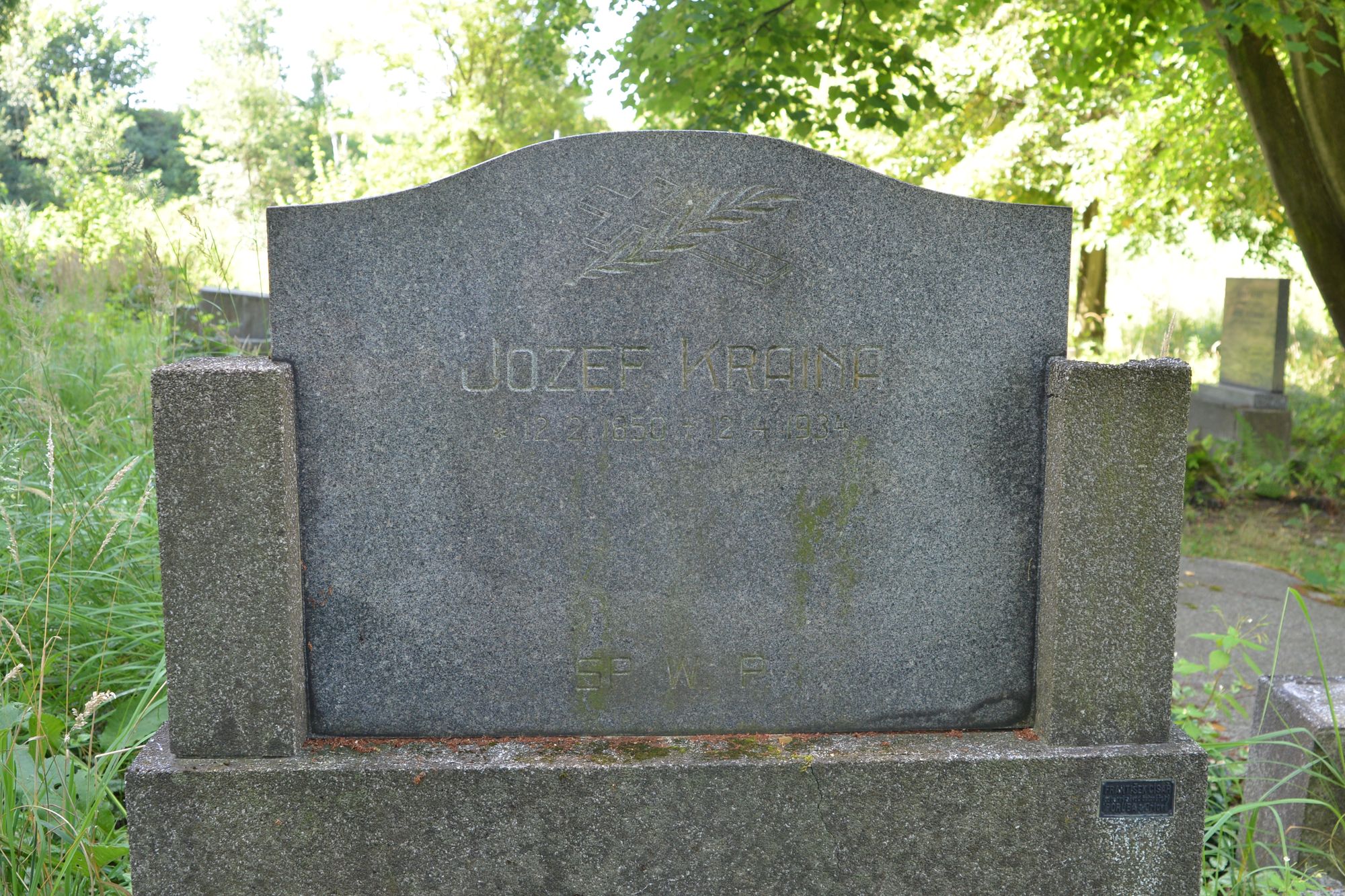 Tablica inskrypcyjna z nagrobka Jozefa Krainy, cmentarz w Karwinie Meksyku w Czechach, stan z 2022 roku