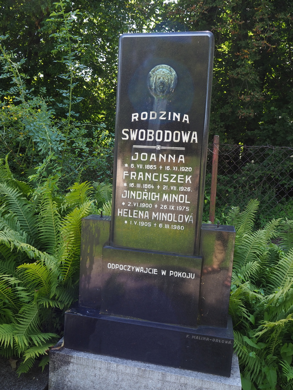 Fragment of a tombstone of the Svoboda family, Karviná Důl cemetery, state from 2022