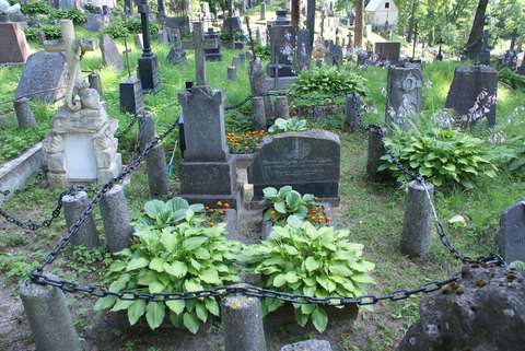 Tombstones next to the gravestone of Barbara and Pavel Cypko, Ross Cemetery in Vilnius, as of 2013.