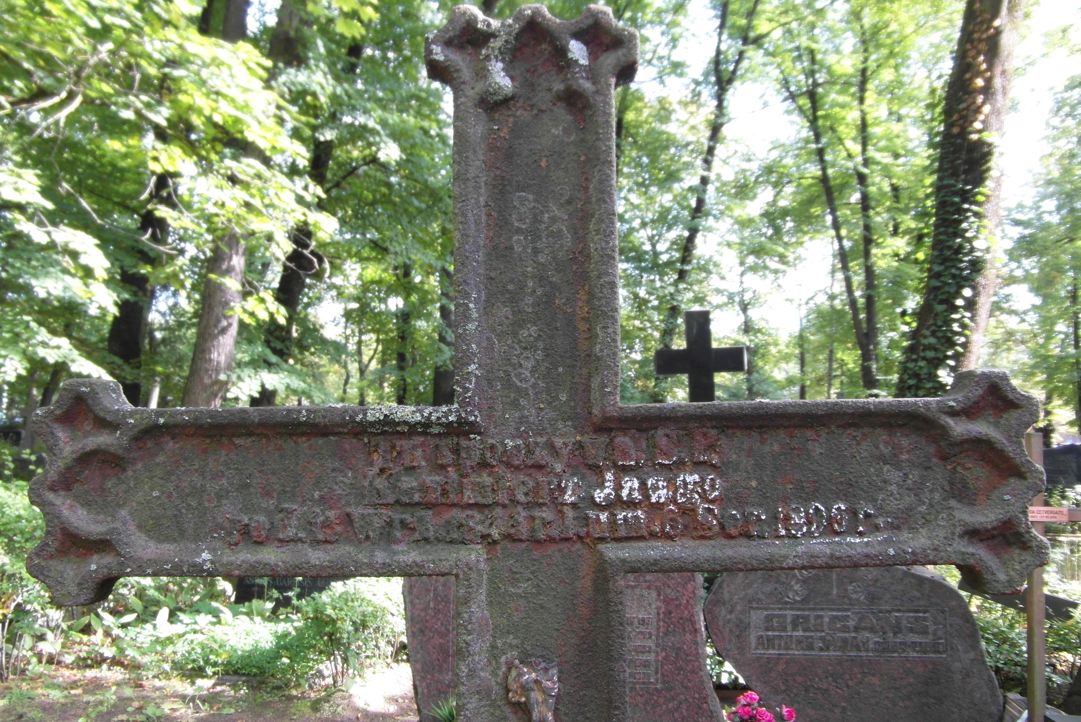 Inscription from the tombstone of Casimir Jawgo, St Michael's cemetery in Riga, as of 2021.