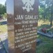 Fotografia przedstawiająca Grób Jana Gawlasa łącznika AK na cmentarzu w Łąkach nad Olzą