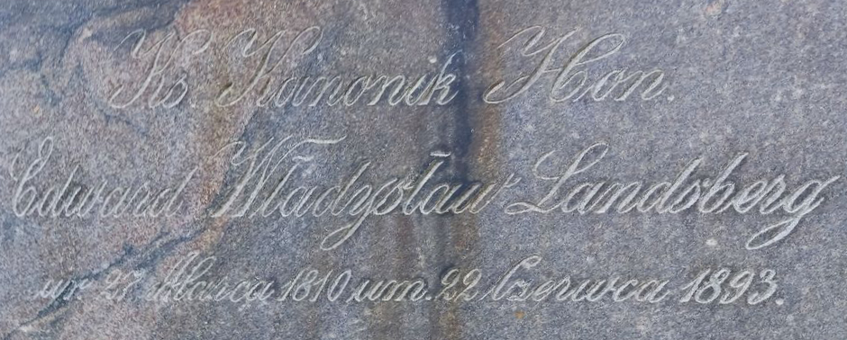 Inscription on the tombstone of Edward Landsberg in St Michael's Cemetery, Riga, as of 2022.