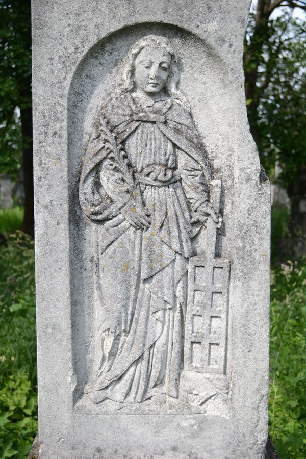 Tombstone of Franciszek, Jan, Józefa and Wiktoria Stocki, fragment with relief, zbaraski cemetery, state before 2018