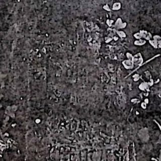 Gravestone of Jadwiga Cremczewska with a cross on a simple pedestal. An inscription is engraved on the front panel.