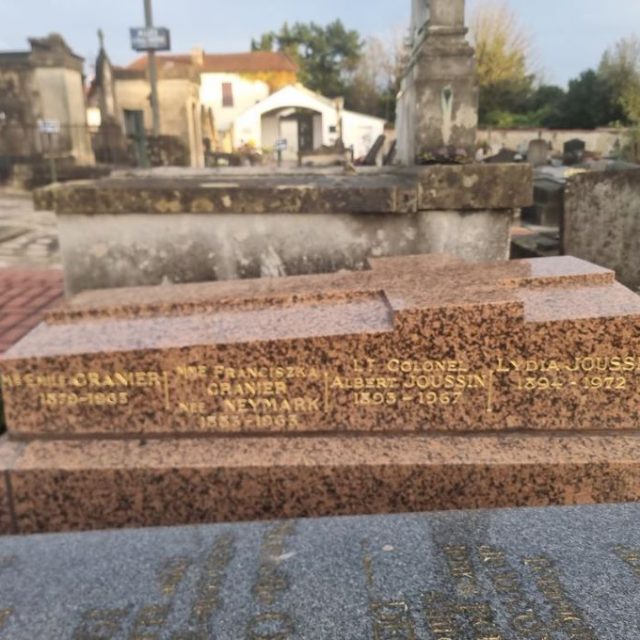 Franciszka Granier’s gravestone at the cemetery in Montmorency. A polished slab of red granite with the following names and dates engraved on it: Emile Granier 1879–1963, Franciszka Granier (née Neymark) 1883–1963, Albert Joussin 1903–1967, Lydia Joussin 1894–1972.