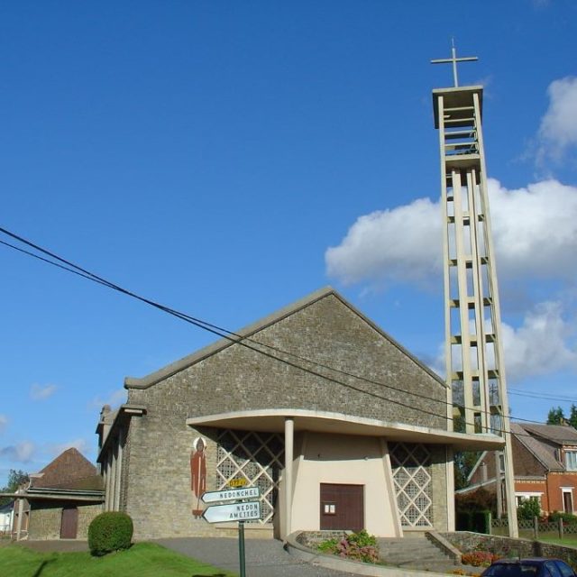 Saint-Germain Church in Fiefs with a sculpture by Jan Lambert-Rucki on the façade